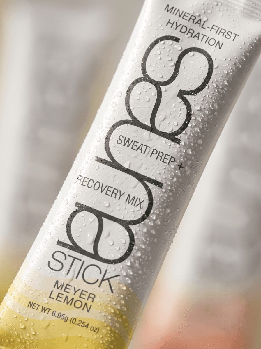 Close-up of a dew-covered Sauna Stick Meyer Lemon stick